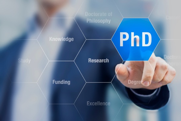Phd Student Pushing Button About Doctorate Of Philosophy Concept Picture Id488002554 